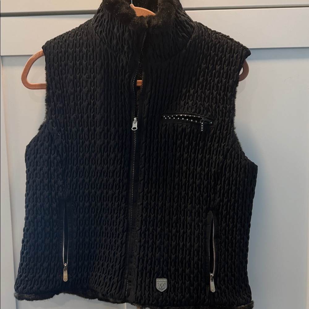 Black vest with faux fur lining and faux diamond pocket detail